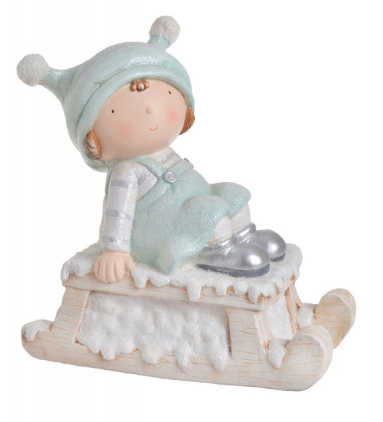 imagine produs Fig. fetita pe saniuta 33cm